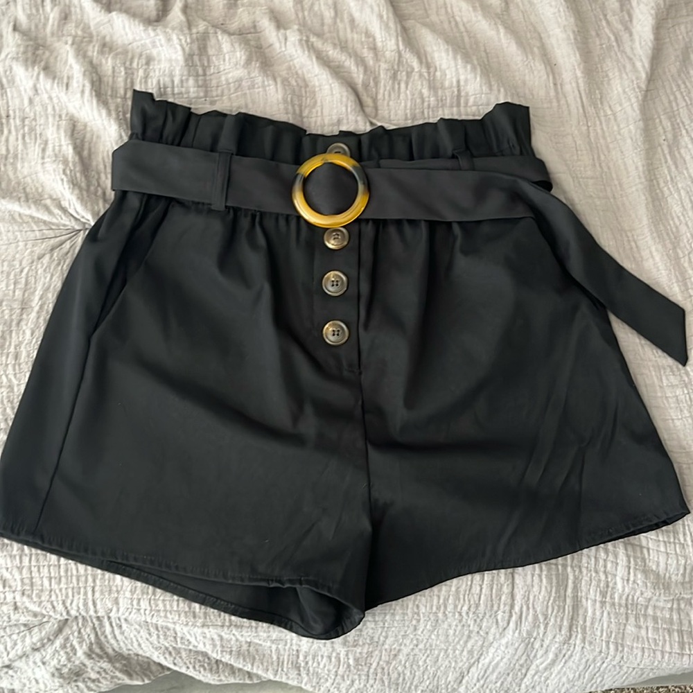 Black high waisted shorts with button details and belt